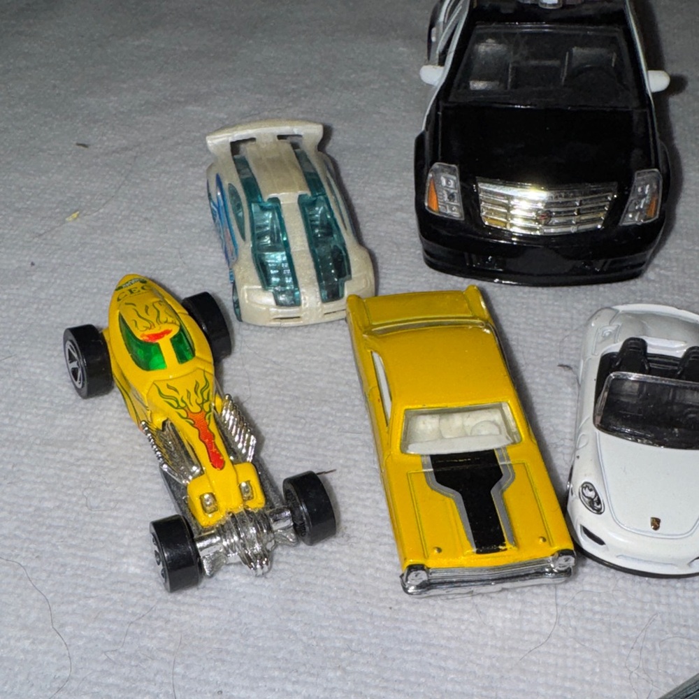 Die-Cast Toy Car Collection with Black, White, and Gold Vehicles - Picture 2 of 5